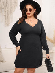 Charcoal sculpted knit midi dress with V-neck and cable detail sleeves.