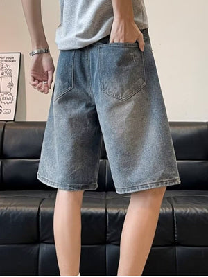 Men's distressed wide leg denim shorts in blue, made of 100% cotton.