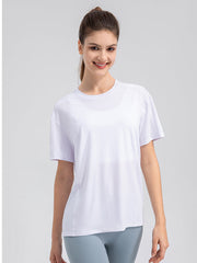 White performance t-shirt with subtle seam details and short sleeves.