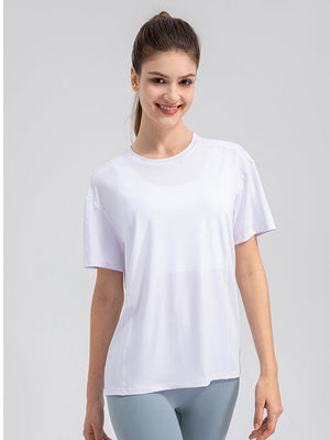White performance t-shirt with subtle seam details and short sleeves.