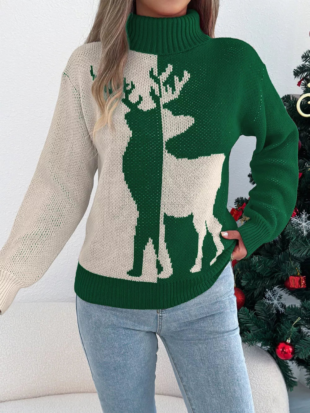 Green and cream colorblock acrylic knit sweater with reindeer graphic and turtleneck.