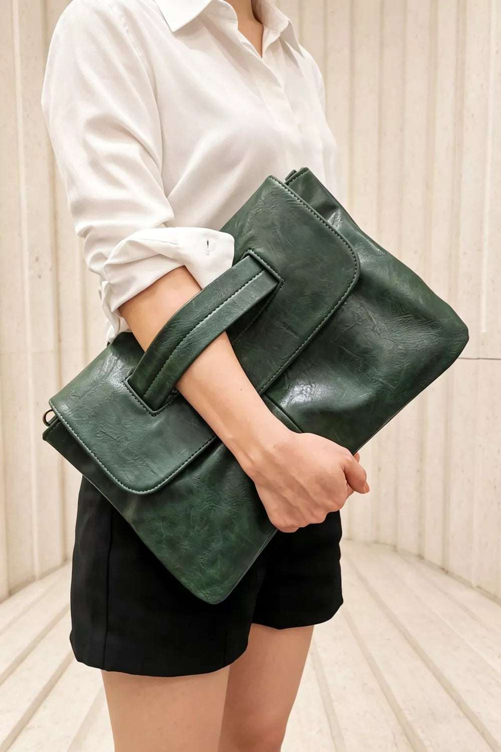 Green distressed leather envelope clutch with cut-out handle