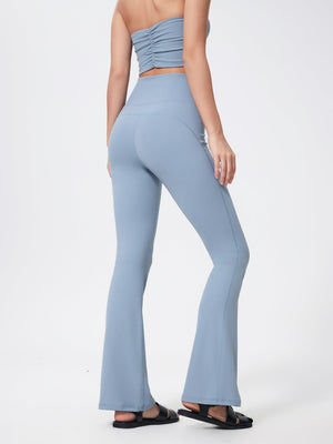 Light blue flared sculpt leggings with high-rise waist and subtle seam details.