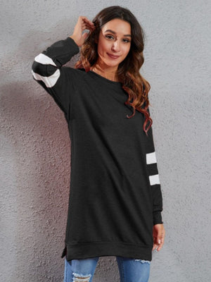 Black sweatshirt dress with varsity stripes on sleeves, crew neck, long sleeves, polyester