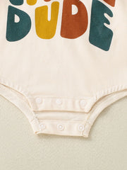 Baby bodysuit in beige with colorful "DUDE" graphic and snap closure