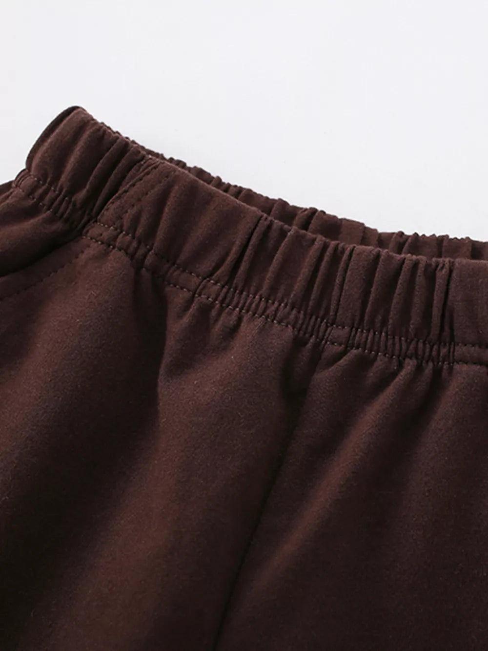 Brown cotton baby shorts with elastic waistband detail