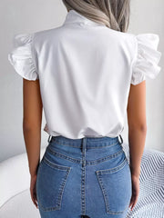 White pussy-bow blouse with ruffled cap sleeves, shown from the back.