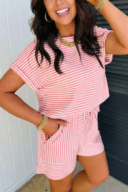 Textured knit two-piece set in pink and white stripes with drawstring shorts and a short-sleeve top.