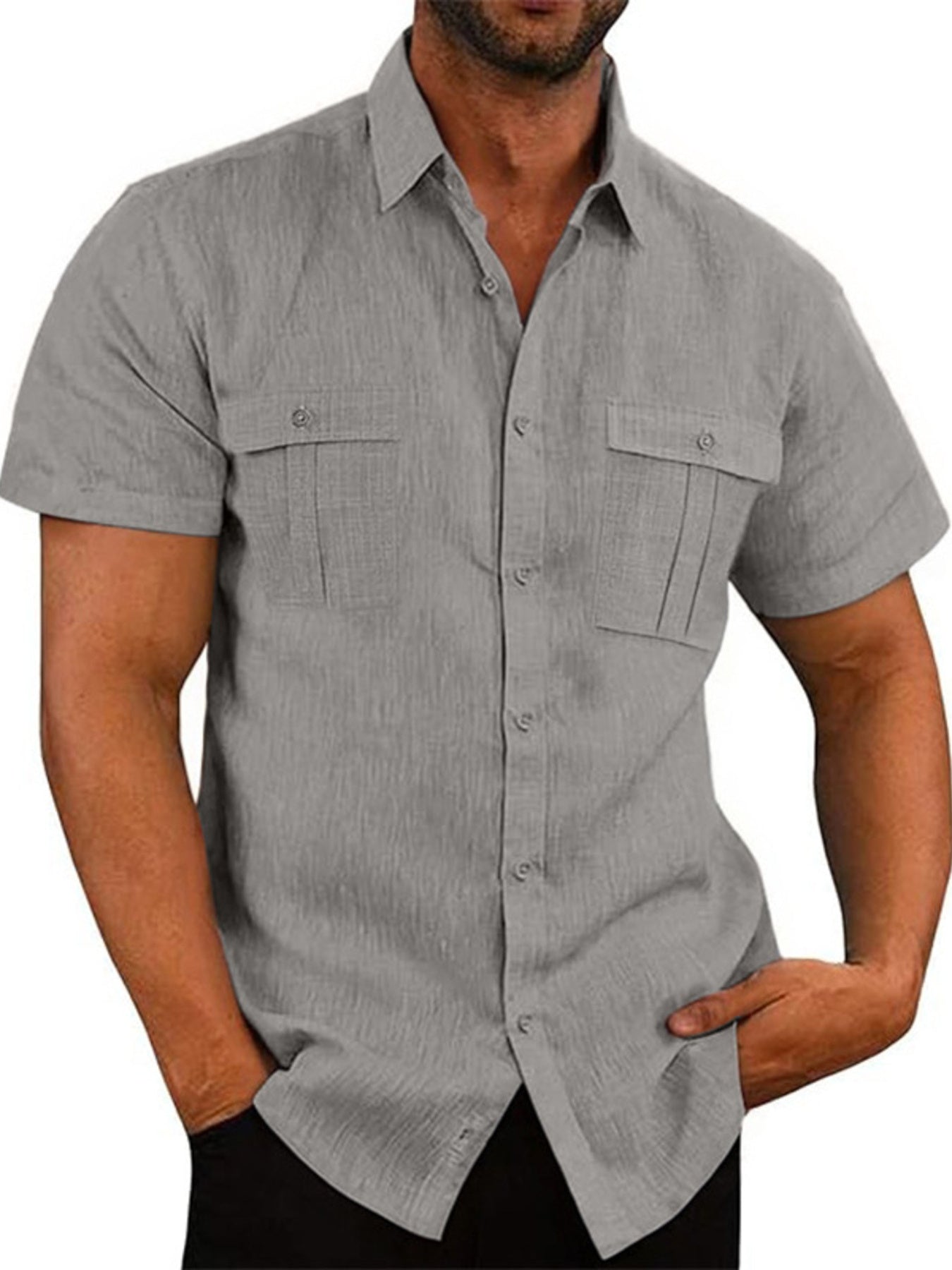 Grey short sleeve button-down shirt with two chest pockets and a collared neckline.