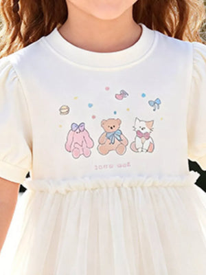 Cream cotton dress with cartoon bears, cats, and bows print, puff sleeves, and tulle skirt.