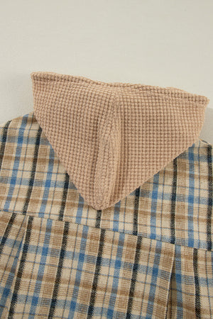 Textured plaid hooded overshirt with raw hem and waffle knit hood detail.