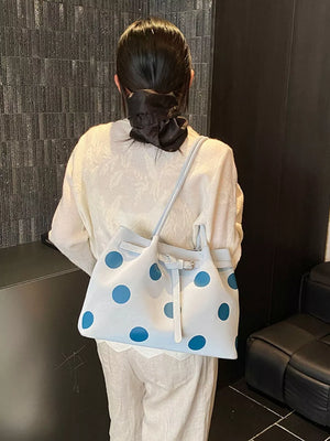 Polka Dot Medium Shoulder Bag in Pastel Blue, model styling view