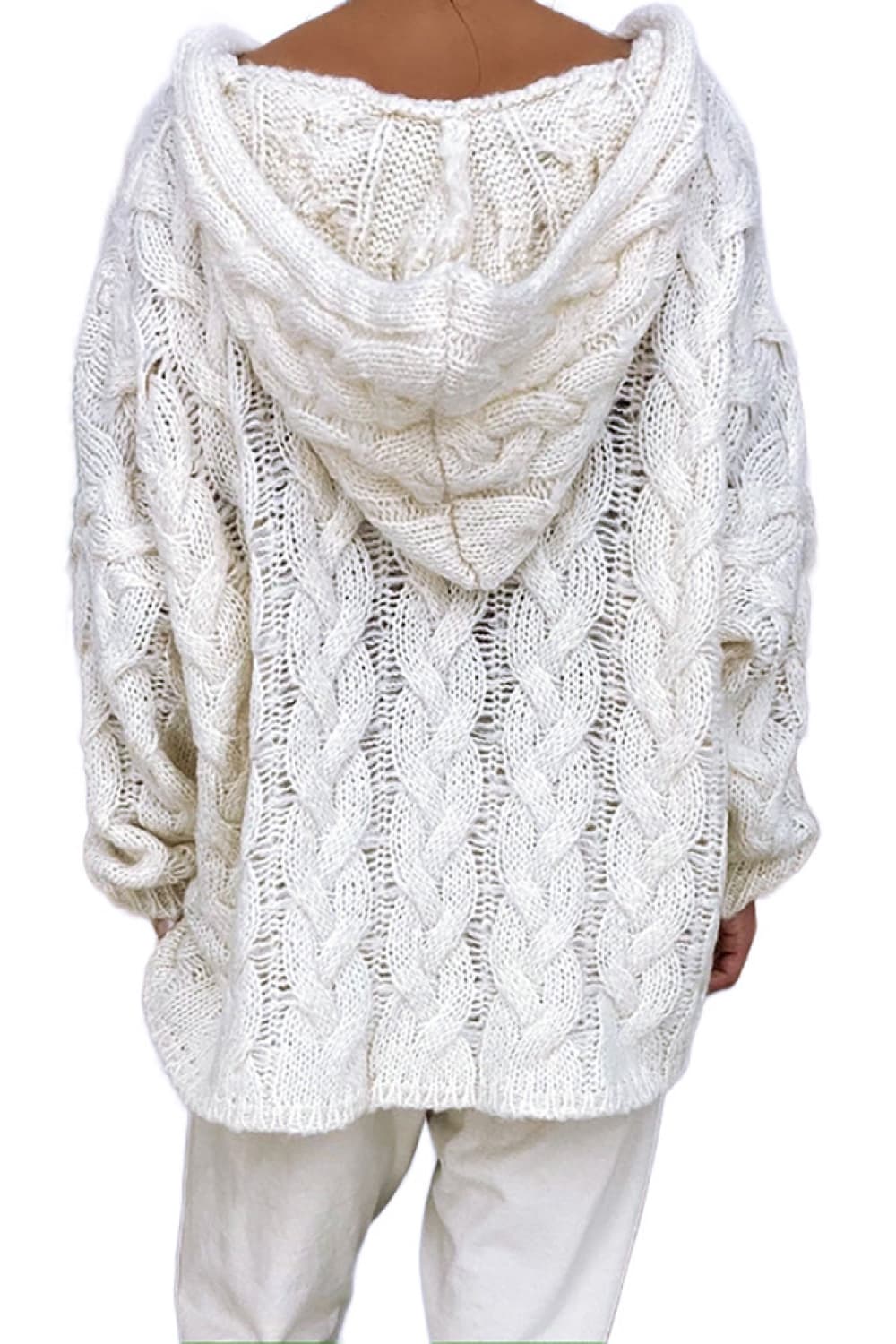 White cable knit hooded cocoon sweater with open knit details.