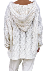 White cable knit hooded cocoon sweater with open knit details.