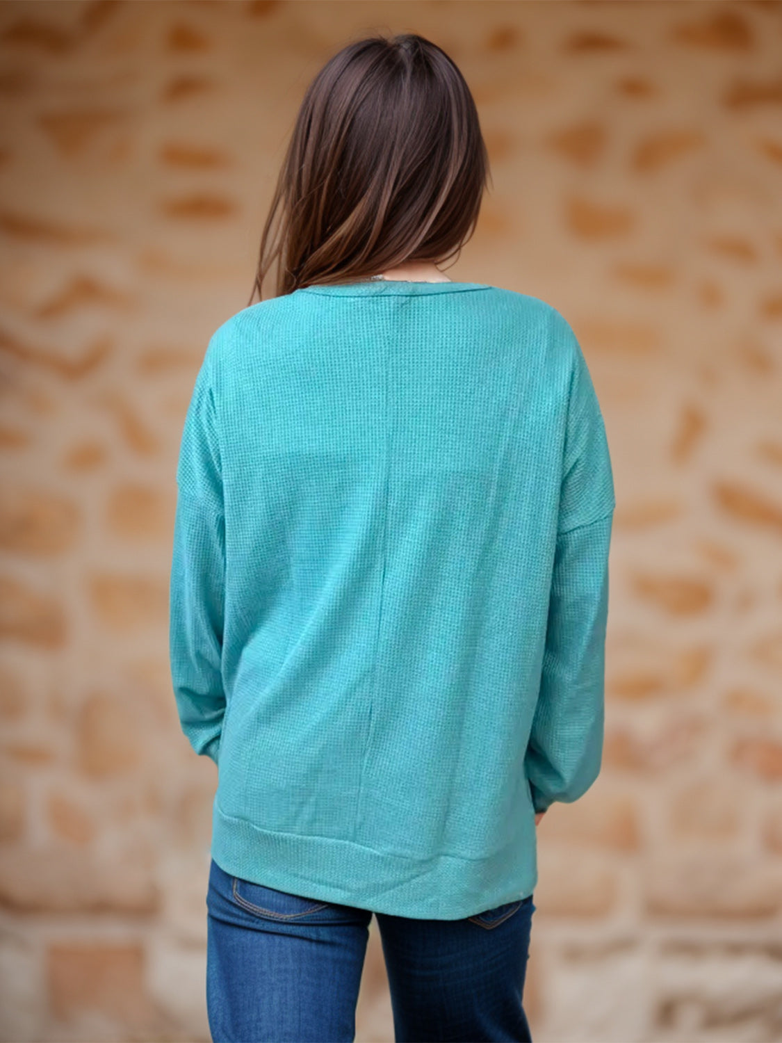 Waffle knit crewneck top in Pastel Blue with relaxed fit and long sleeves.