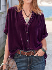 Velvet button-down blouse in plum purple with mandarin collar and short sleeves.