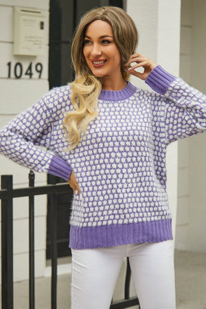 Lavender and white bouclé knit sweater with contrast trim and geometric pattern.