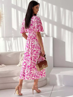 Hot pink and white abstract pattern midi dress with flutter sleeves and a-line skirt.