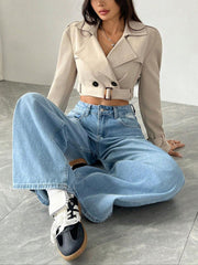 Beige cropped double-breasted trench coat with belt and button details