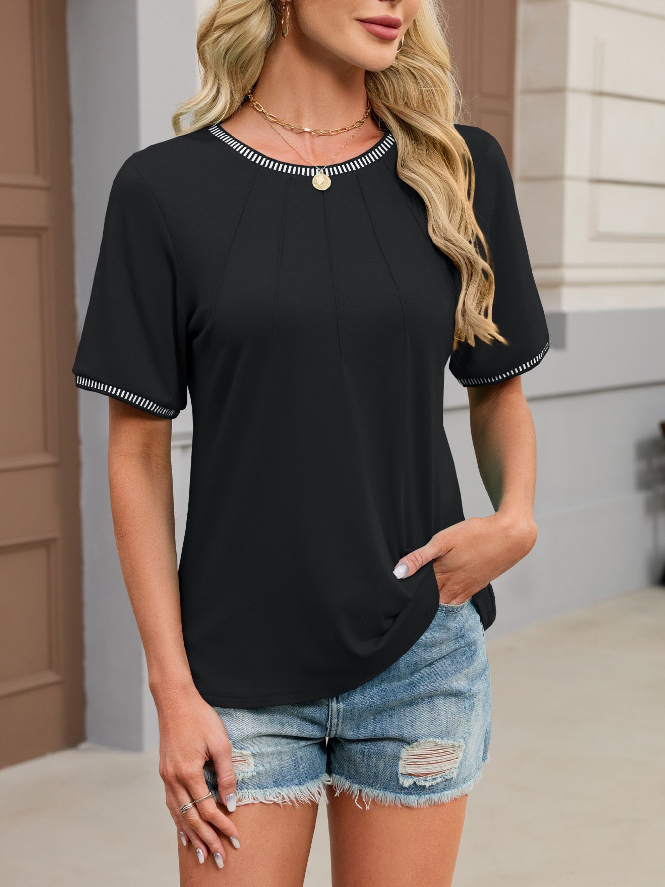 Black t-shirt with contrast trim on neckline and sleeves, short sleeves, crew neck