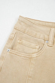 High-waisted cropped wide-leg jeans in tan denim with front pockets and silver rivets.