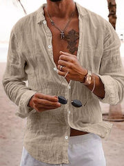 Khaki relaxed fit linen shirt with button front and collar, styled casually.