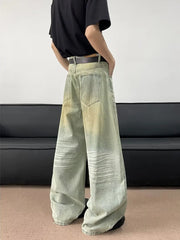 Men's oversized light blue jeans with creasing and faded details