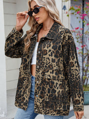 Leopard print denim utility jacket with chest pockets and button front.