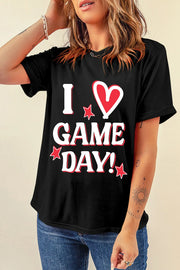 Black graphic tee with I Heart Game Day text and red stars.