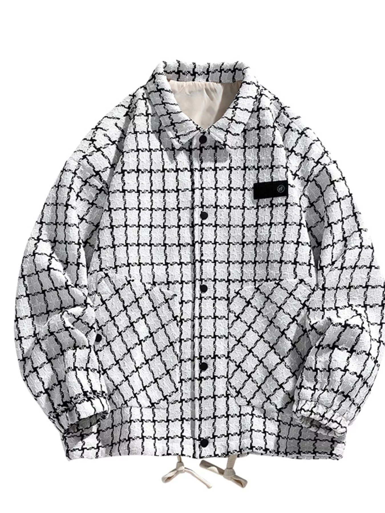 Oversized white plaid button-up jacket with black checks and two front pockets.