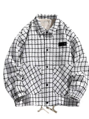Oversized white plaid button-up jacket with black checks and two front pockets.