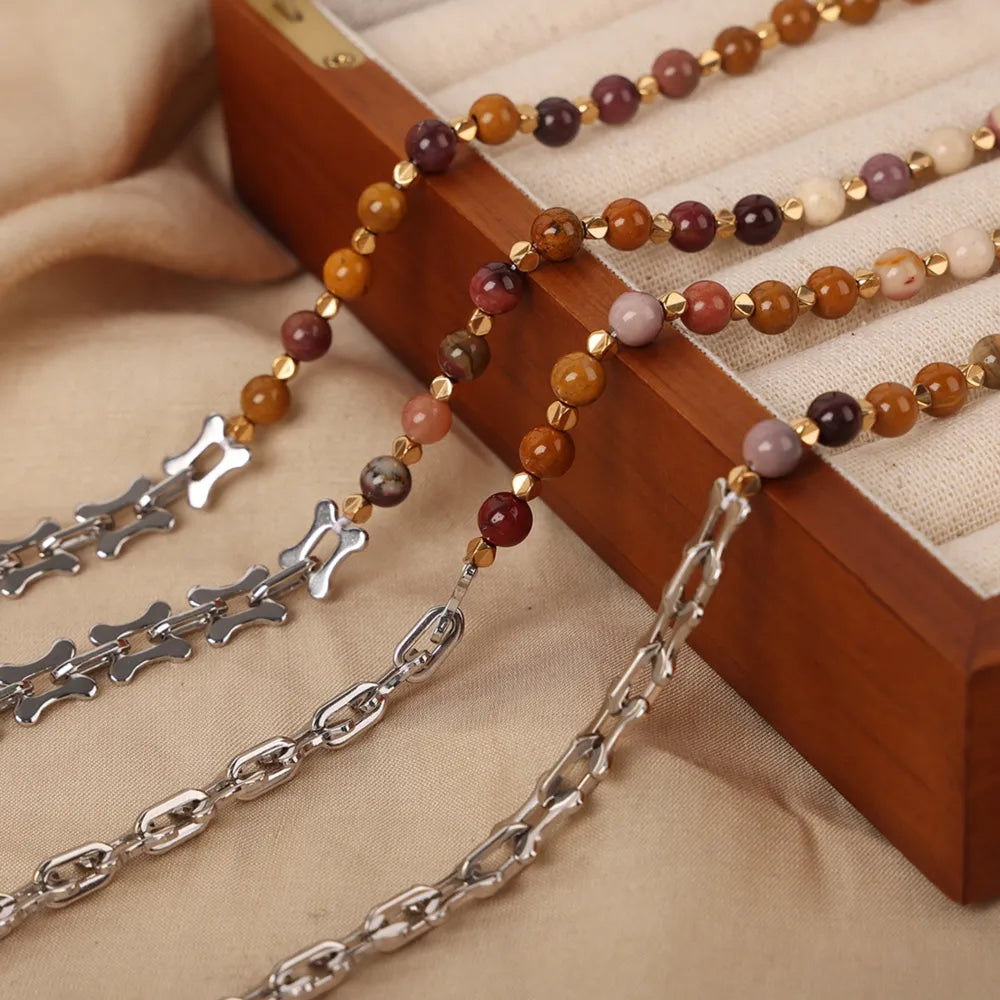 Silver asymmetrical chain necklace with mixed stone beads and gold accents