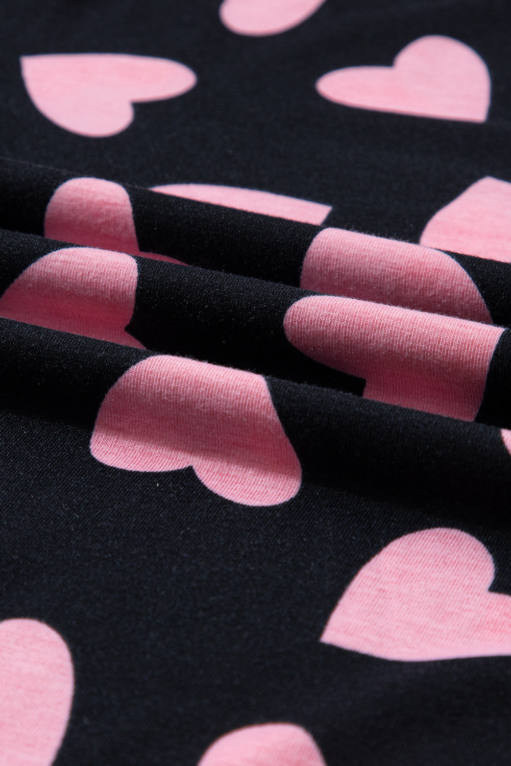 Black lounge set with pink heart print detail