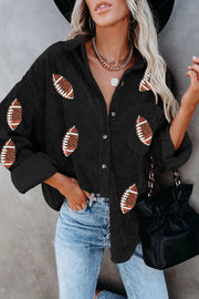 Black corduroy shirt jacket with all-over football embellishments and button front.