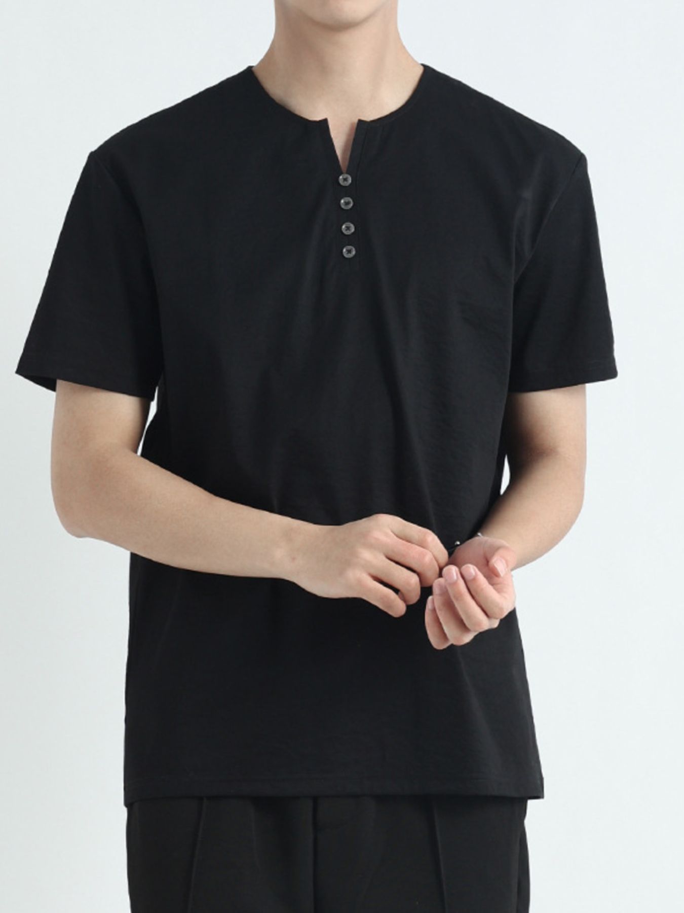 Men's black short sleeve cotton henley t-shirt with button placket