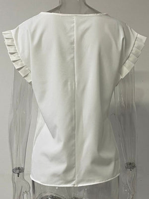 White cap-sleeve blouse with pleated sleeve details and a seam down the back.