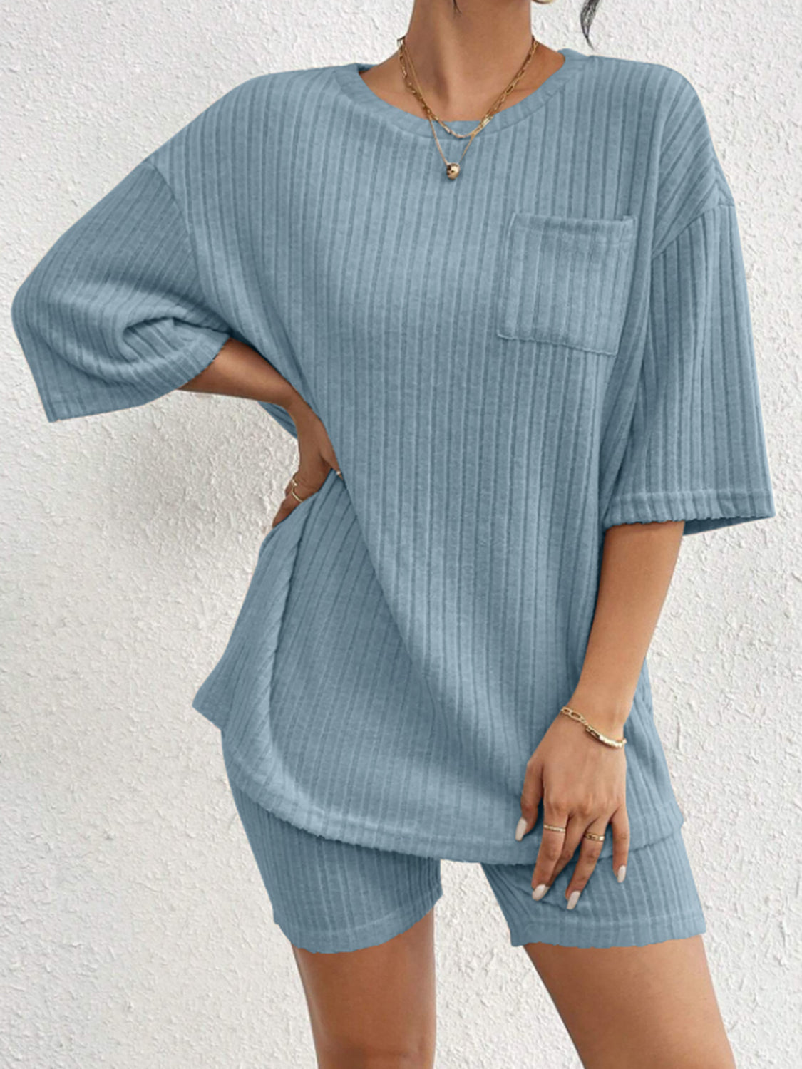 Light blue ribbed lounge set with short sleeves and a chest pocket.