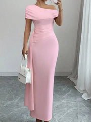 Pink asymmetrical ruched maxi dress with off-the-shoulder neckline and draped detail.