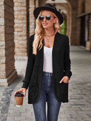 Black textured ribbed open-front cardigan with pockets and long sleeves.