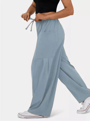 Air Force Blue wide-leg jeggings with drawstring and cargo pockets.