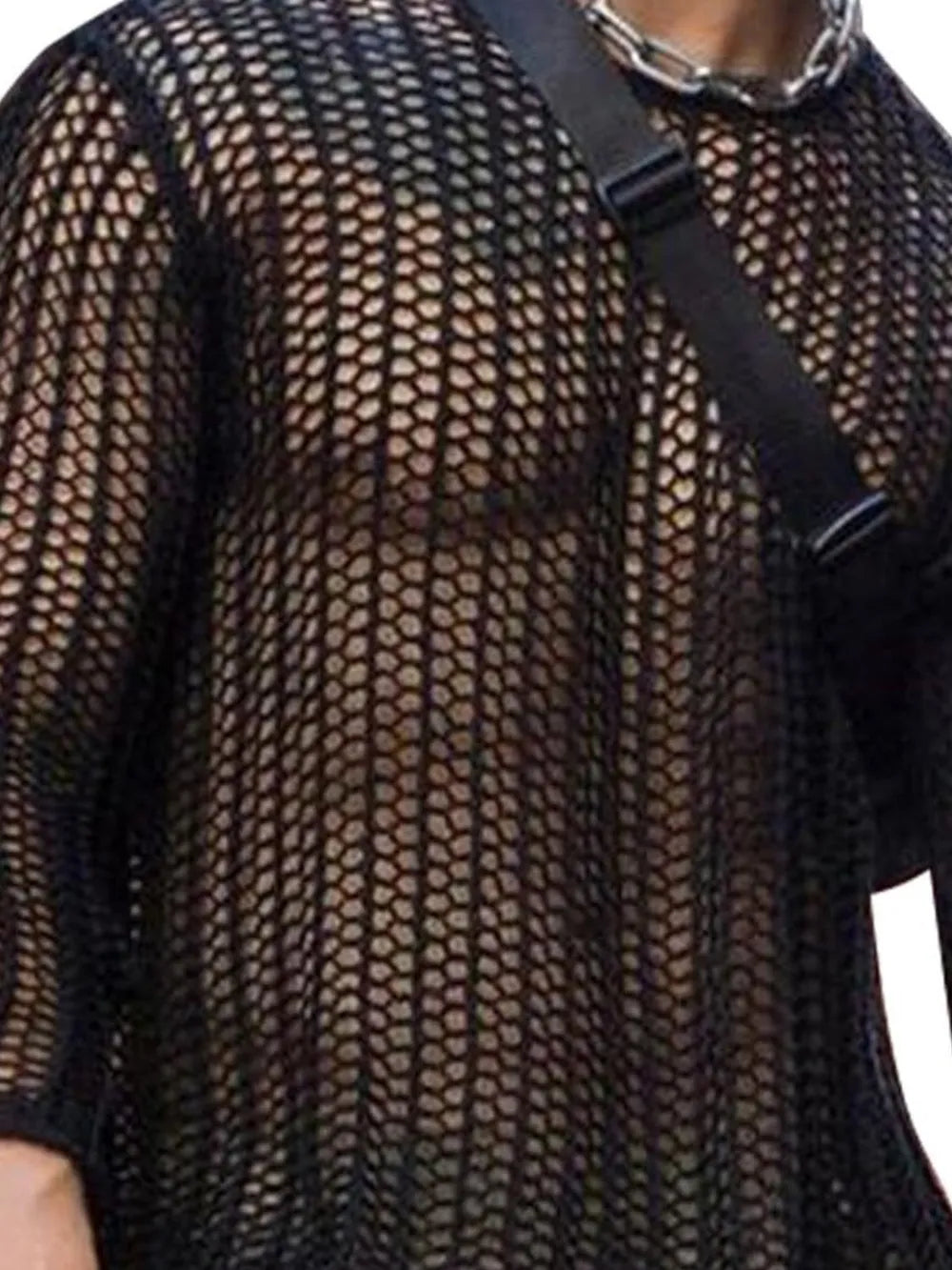 Black open-knit crewneck long sleeve sweater with a sheer fishnet pattern.