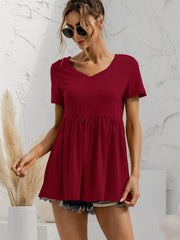 Burgundy v-neck tee with gathered waistline and short sleeves