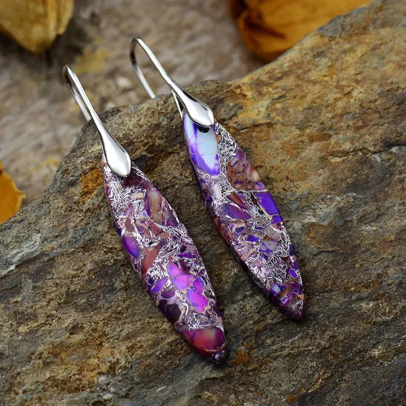 Verdant Stone Teardrop Dangle Earrings in Purple/Silver with intricate patterns.