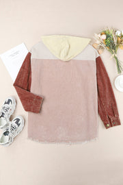 Colorblock corduroy hooded utility jacket in pink, tan, and rust with frayed hem.