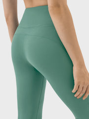 Flared sculpt leggings in turquoise with a high-rise waist and seamless detailing.