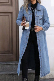 Longline blue denim jacket with pockets, button front and collared neckline.