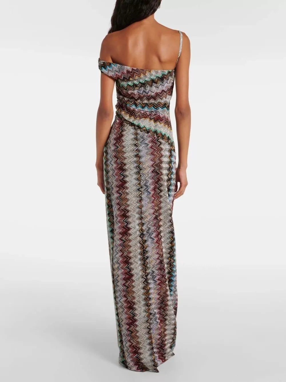 Vibrant one-shoulder maxi dress with chevron pattern and asymmetrical neckline.