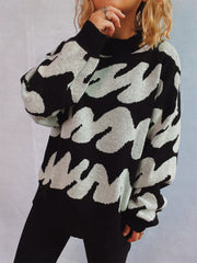Graphic Wave Knit Sweater in black and white with a mock neck and long sleeves.