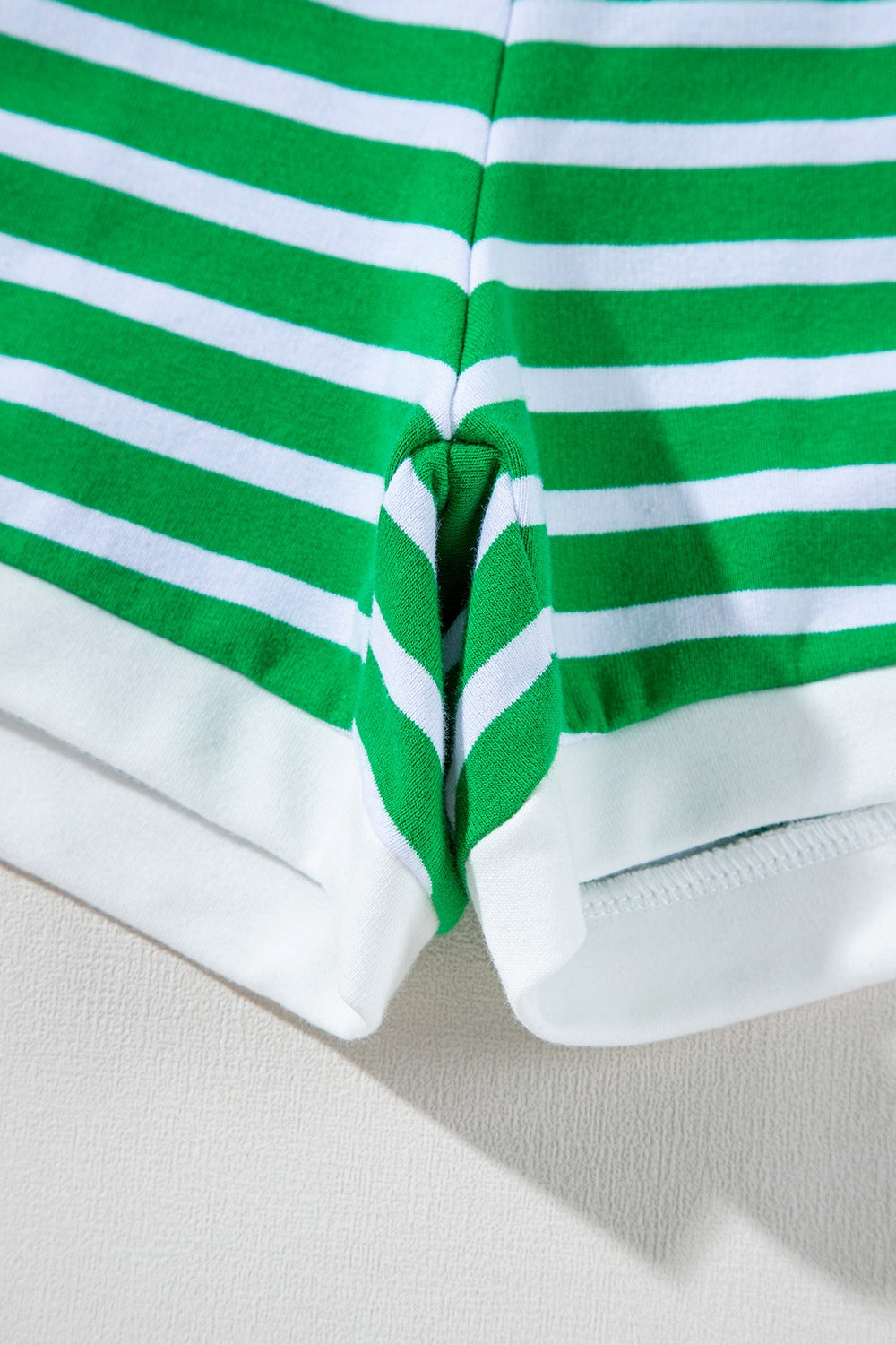 Green and white striped cotton loungewear shorts with white trim