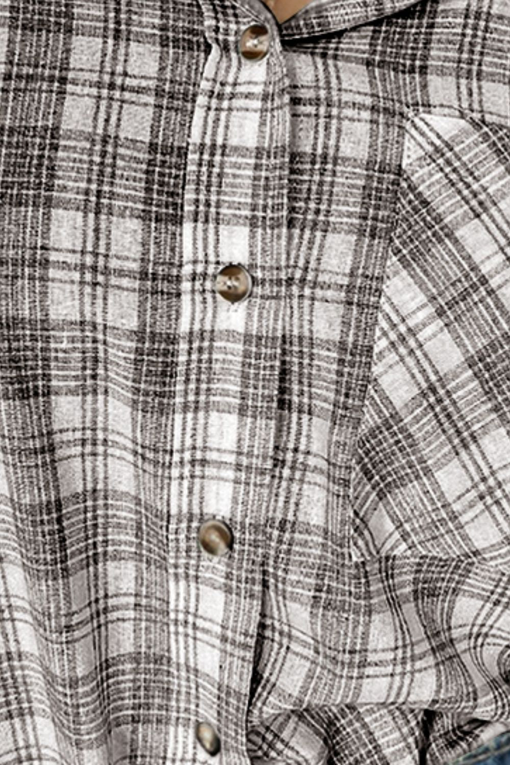 Plaid hooded shirt jacket in cotton with button front and drawstrings.